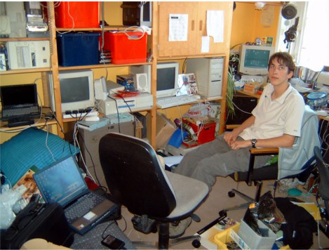 me in my room, (this pic is a little out of date, ive now got a 21" moniter!)